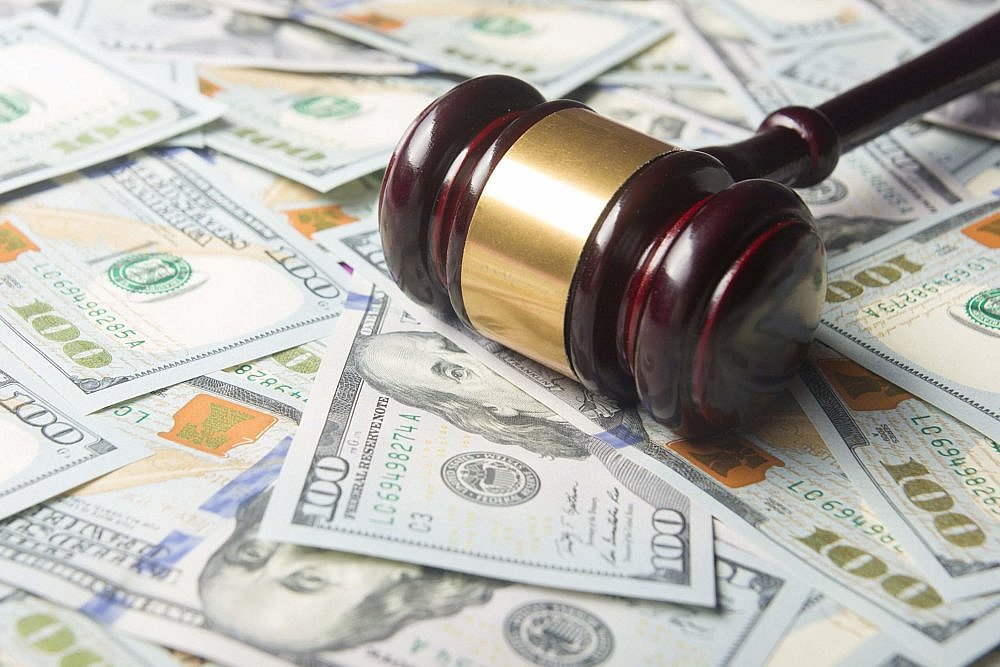 Gavel on top of cash, signifying bail and discovery.