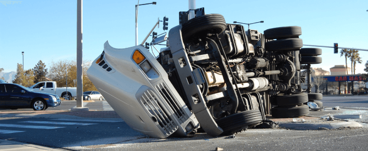 Rollover truck accident in the middle of an intersection