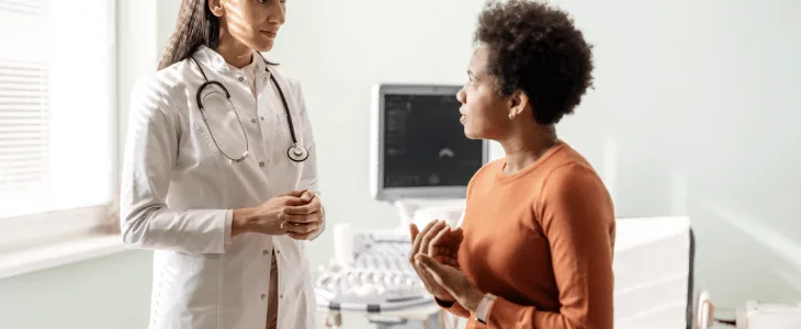 Doctor speaking with a patient