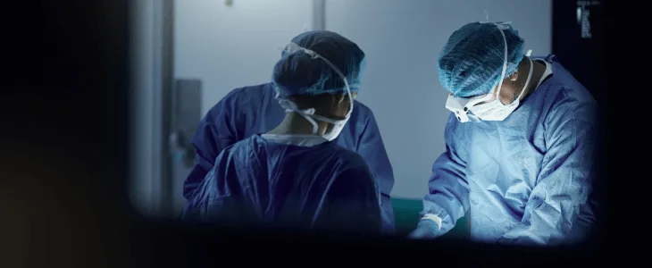 Surgical room full of doctors